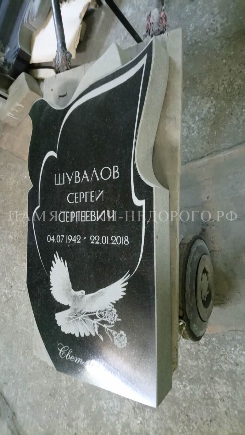 Памятники на могилу с птицами