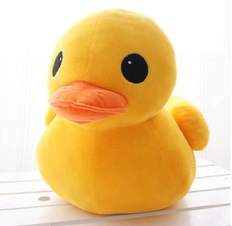 Игрушка лежащий утенок